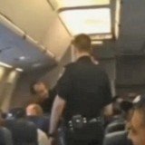 A female passenger was kicked off from an American Airlines plane after the pilot was forced to make an emergency landing as she refused to stop singing Whitney Houston's hit song I Will Always Love You