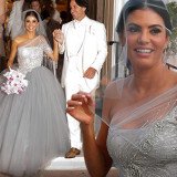 Adriana De Moura wore a grey rhinestone-embroidered one-sleeve princess gown with a tulle skirt