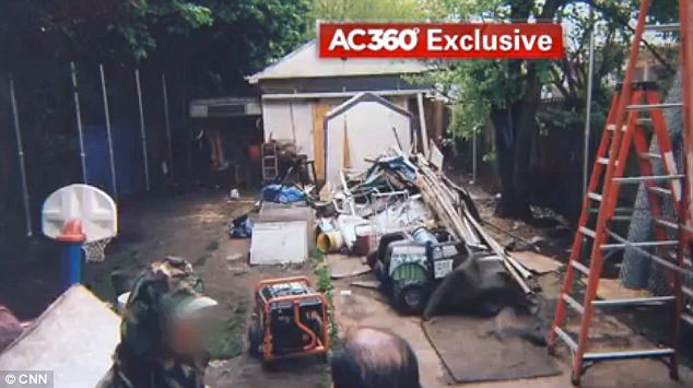 Ariel Castro had spools of barbed wired tossed about his backyard alongside heavy metal chains and rolls of tarp that he used to hide his neighbor's view