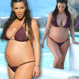 As she proudly showed off her bump in a simple bikini Kim Kardashian proved she is finally at ease with her new shape