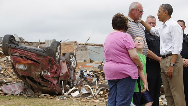 Barack Obama has visited the tornado-ravaged town of Moore in Oklahoma to comfort its victims 
