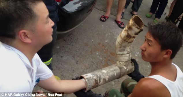 Chinese firefighters have rescued a newborn baby boy lodged inside a sewage pipe leading off a toilet