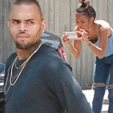 Chris Brown was involved in a minor car accident after he rear ended another car, and none other than Karreuche Tran was seen standing with him at the scene