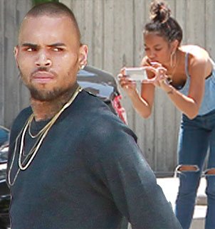 Chris Brown was involved in a minor car accident after he rear ended another car, and none other than Karreuche Tran was seen standing with him at the scene