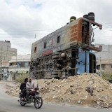 Fighting has raged in Syrian town of Qusair near Lebanon border after government troops launched a major operation to seize the strategic rebel stronghold