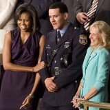 Former Philadelphia police officer Richard DeCoatsworth once hailed as a hero and given a seat next to Michelle Obama, has been arrested and charged with rape and other crimes