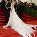 Katie Holmes revealed her bony back as she attended the Metropolitan Museum of Art's Costume Institute Gala on Monday night in New York City