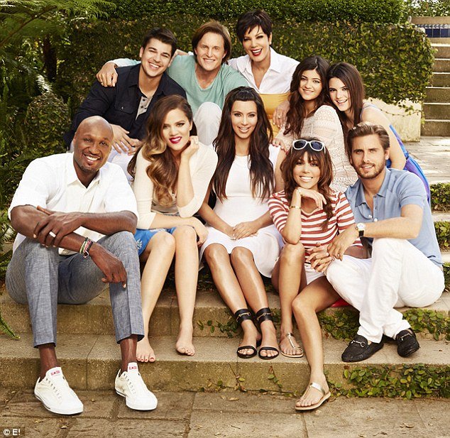 Lamar Odom appears in the Kardashian portrait to promote the new season of their hit reality show Keeping Up With The Kardashians
