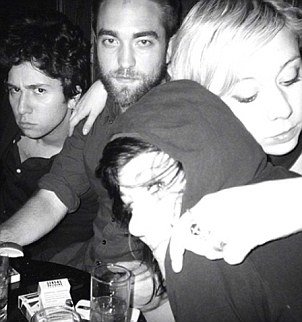Polly Stenham with her arm draped around Robert Pattinson and another pal as they enjoyed a night out in New York City
