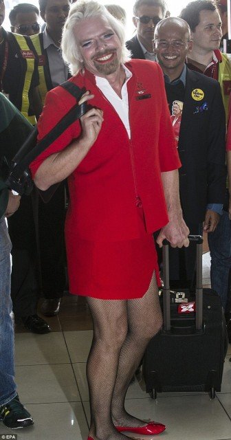 Richard Branson forced to dress as a stewardess after losing Formula 1 bet with AirAsia chief Tony Fernandes