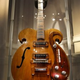The guitar played by John Lennon and George Harrison of the Beatles has sold for $408,000 at auction