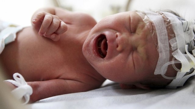 The newborn baby boy rescued from a toilet pipe in China has been released from hospital