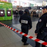 The soldier was on patrol in the area of La Defense when he was stabbed in the neck by an unknown man who escaped