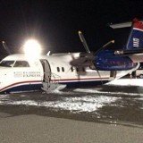 US Airways pilot makes belly landing at Newark airport as 34 terrified passengers escape alive after gear failed