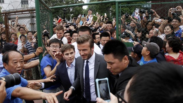 At least seven people have been injured in a stampede in China, which happened when David Beckham arrived at Shanghai Tongji University