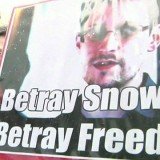 Hundreds of protesters in Hong Kong have marched to the US consulate in support of ex-CIA whistleblower Edward Snowden