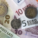 Latvia will become the 18th EU country to use the euro after being approved for membership by the European Commission