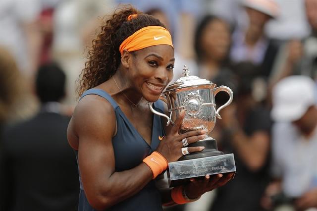 Serena Williams won a second French Open title 11 years after her first with a convincing win over defending champion Maria Sharapova