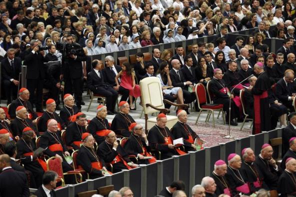 The white papal armchair set up in the presumption that Pope Francis would be there remained empty during Vatican Beethoven concert