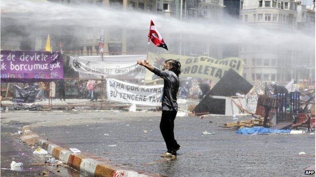 Turkish police clashed with protesters in Istanbul's Taksim Square, despite a warning from PM Recep Tayyip Erdogan