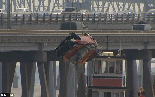 A young woman survived when her car was knocked 40ft off Chesapeake Bay Bridge 