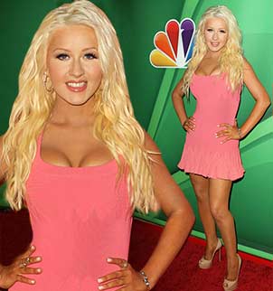 Christina Aguilera silenced last year's fat-shaming critics by showcasing her 20 lbs weight loss in a pink mini-dress at a NBC press event in Beverly Hills 