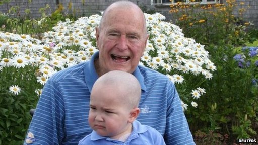 George H.W. Bush has shaved his head to show support for a boy who has leukaemia