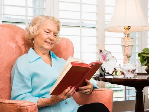 Keeping mentally active by reading books or writing letters helps protect the brain in old age