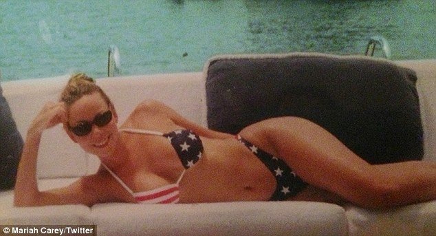 Mariah Carey tweeted a star-spangled bikini snapshot to promote her performance on Macy's Fourth of July Fireworks Spectacular