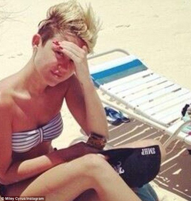 Miley Cyrus ditched make-up and clothes on her holiday in the Bahamas