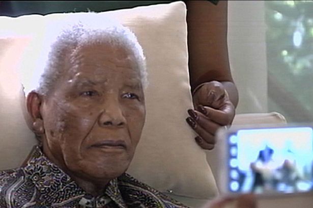 Nelson Mandela is being kept alive by a breathing machine and faces impending death