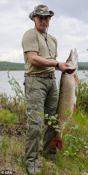 Vladimir Putin landed a 21 kg pike during a fishing trip to Siberia