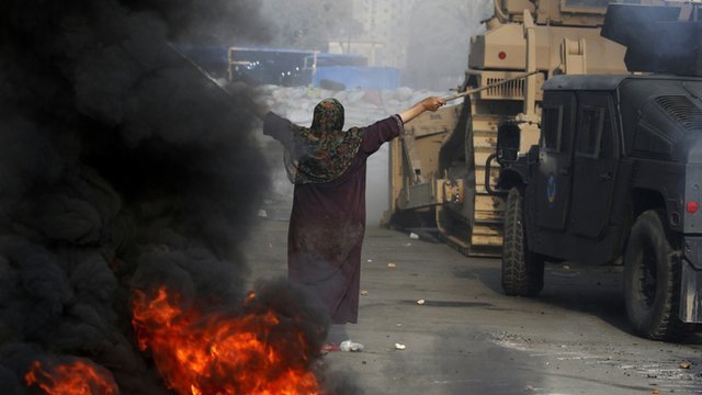 Egypt has declared state of emergency after scores of people were killed when security forces stormed pro-Morsi protest camps in Cairo