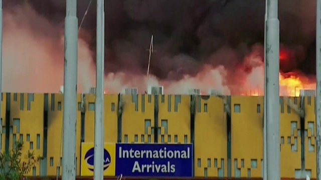 International flights have begun landing at Nairobi's international airport a day after fire gutted the arrivals hall