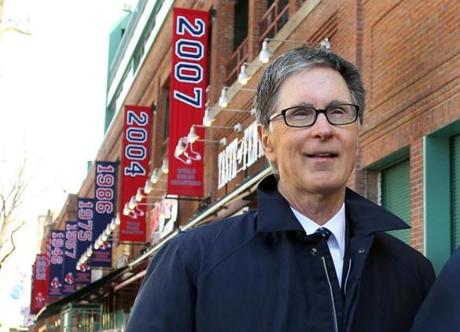 John W. Henry, the main owner of the Boston Red Sox baseball team and Liverpool Football Club, bought the Boston Globe for $70 million