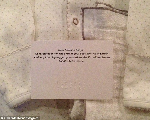 Kim Kardashian uploaded a picture of baby clothes and a note sent by Katie Couric 