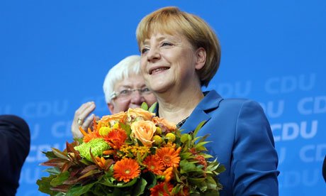 Angela Merkel has urged her party to celebrate "a super result" after exit polls suggested CDU was set to win a third term
