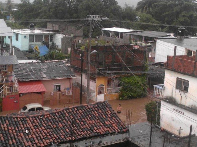 At least 97 people have been killed by storms that hit Mexico