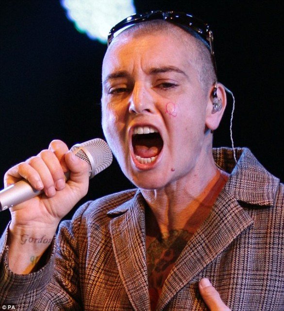 Sinead O'Connor displayed the initials “B” and “Q” on her cheeks while onstage at Bestival music festival