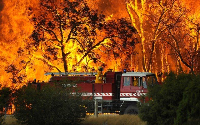 Australian authorities are investigating whether a military training exercise using explosives may have started one of the huge bush fires burning in the state of New South Wales
