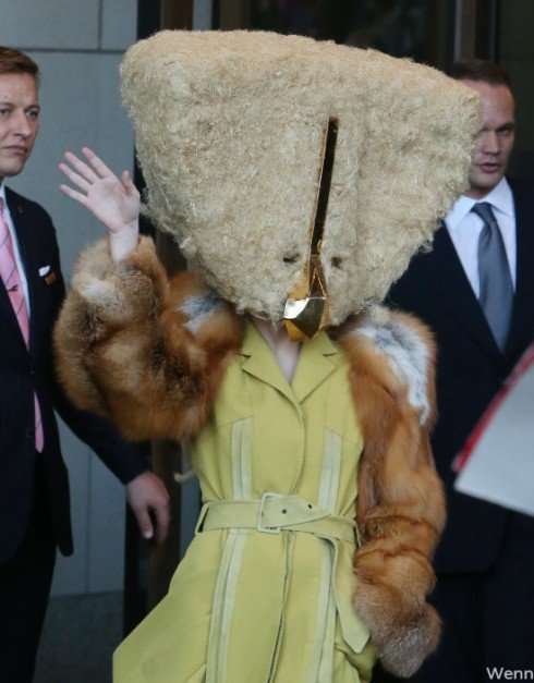 Lady Gaga wearing a furry cheese mask in Berlin