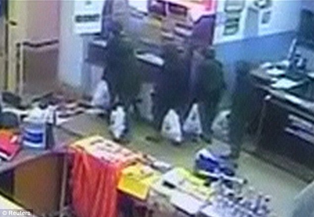 Nairobi shopping center’s security camera footage shows what appear to be Kenyan security forces looting goods during last month's siege of the Westgate mall
