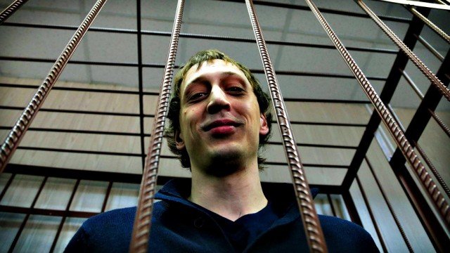 Pavel Dmitrichenko has pleaded not guilty to ordering an acid attack on company's artistic director Sergei Filin