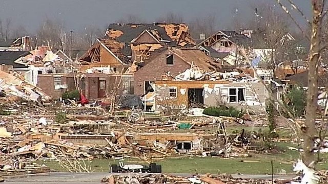 Dozens of tornadoes killed at least six people, injured many others and left devastating damage in parts of Illinois