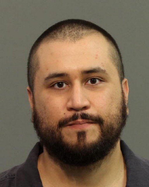 George Zimmerman has been arrested on charges he pointed a shotgun at his girlfriend