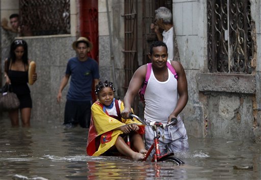 Heavy rain has lashed Cuba since Friday, flooding streets and leaving at least two people dead