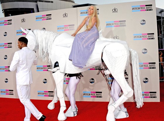 Lady Gaga arrived on the red carpet at the 2013 American Music Awards on top of a fake white horse
