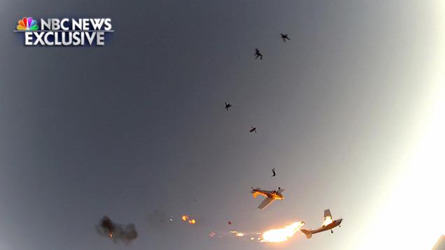 Nine skydivers and two pilots escaped as their planes crashed in midair
