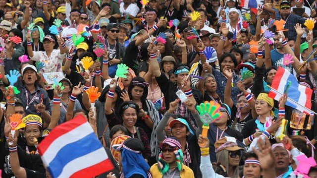 Thai protesters have surrounded several more ministries, as street demonstrations continue in Bangkok