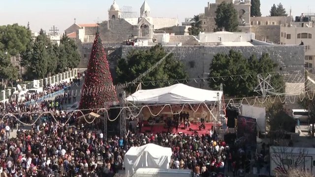 Crowds of pilgrims and tourists have begun to gather in the biblical town of Bethlehem to kick off Christmas Eve celebrations